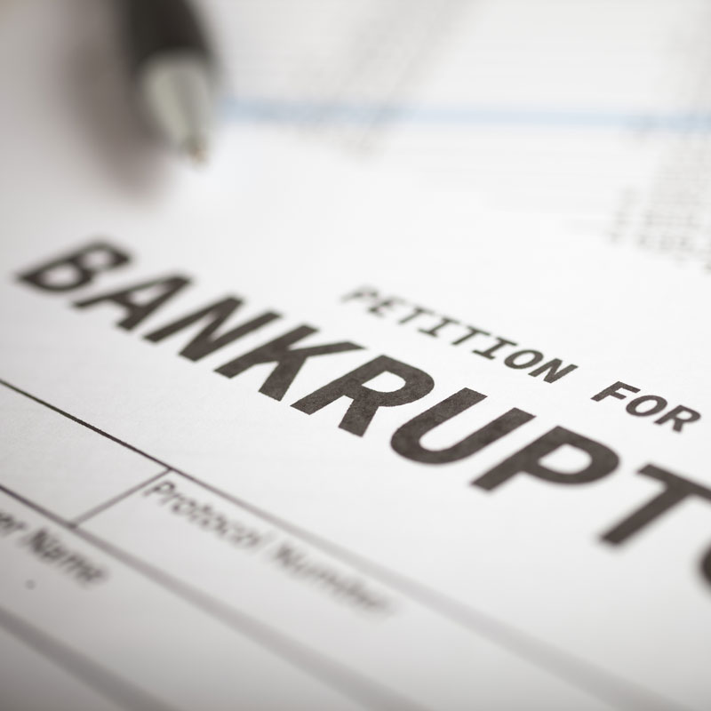 Bankruptcy lawyer in Los Angeles, CA reviewing a petition of bankruptcy document