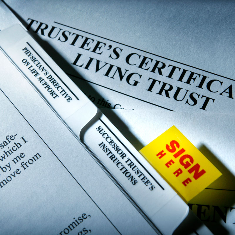 Man reviewing living trust documents in a law office in Los Angeles, CA