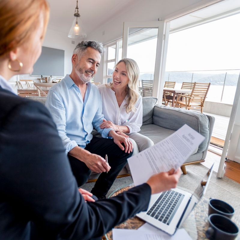 Couple in Los Angeles, CA, working on estate planning paperwork with their lawyer