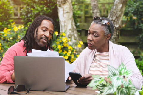 Couple working on their Estate Planning out in the park in Los Angeles, CA