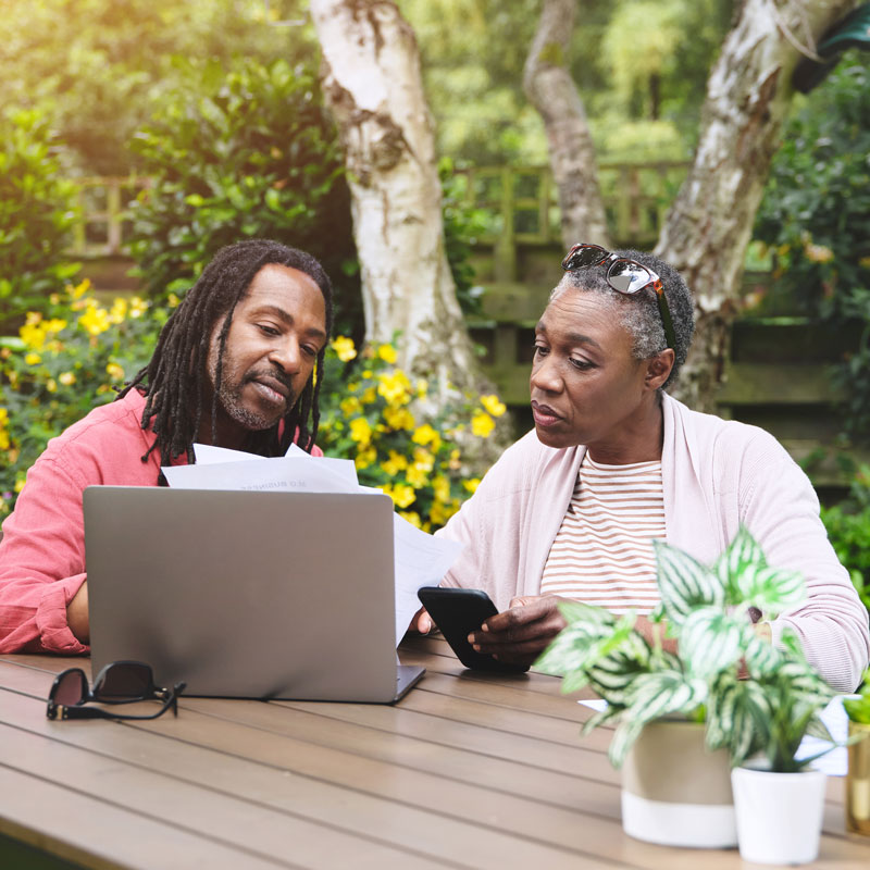 Couple working on their Estate Planning out in the park in Los Angeles, CA