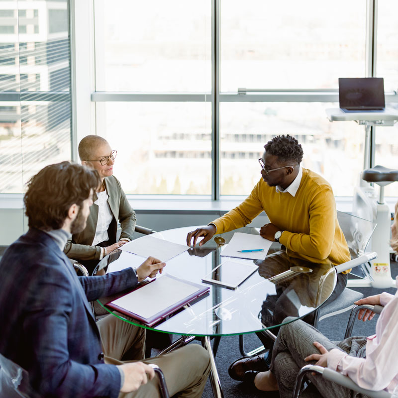 Group of people discussing Trust Litigation with a lawyer in Los Angeles, CA