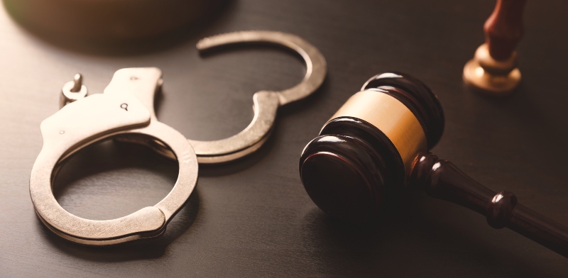 Gavel and handcuffs on the table - Criminal Defense Lawyer in Odgen, UT