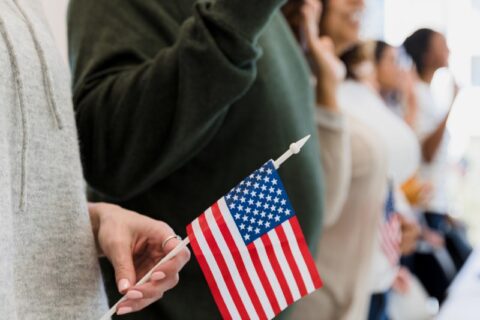 People Pledging Allegiance to the Flag - Immigration Lawyer for Citizenship in Utah