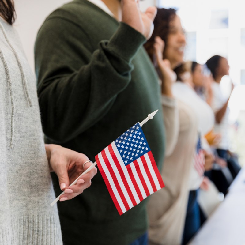 People Pledging Allegiance to the Flag - Immigration Lawyer for Citizenship in California