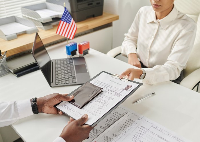 Lawyer taking Immigration adjustment of status documents